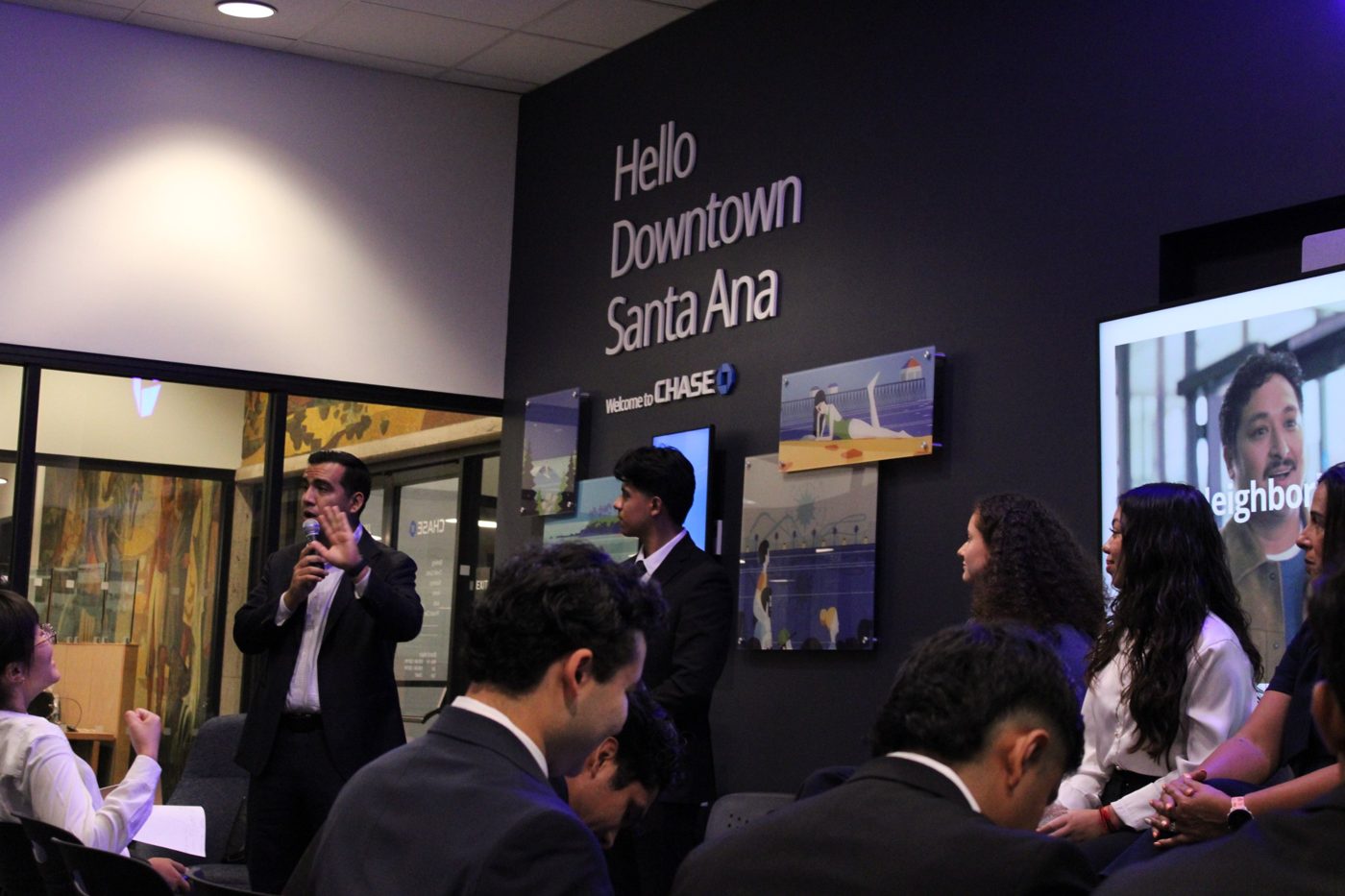 A JPMorgan Chase speaker addresses students at the Santa Ana Community Center