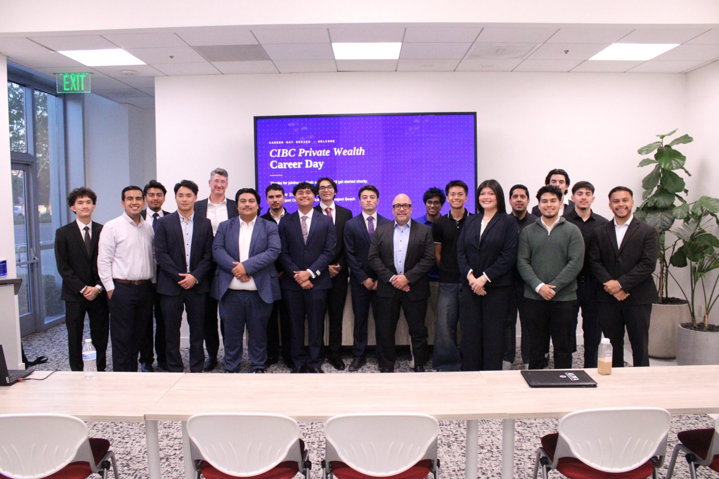 Students and CIBC Private Wealth professionals gather for a group photo
